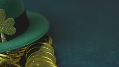 Studio-Shot-Of-Green-Leprechaun-Top-Hat-And-Piles-Of-Gold-Coins-To-Celebrate-St-Patricks-Day-11