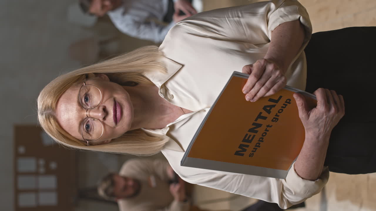Portrait of Female Specialist at Mental Support Therapy Session
