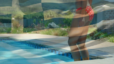 animation of flag of greece over midsection of biracial woman walking into swimming pool