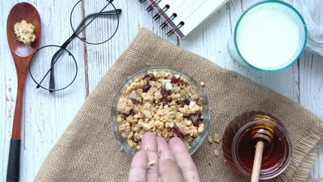 healthy breakfast with granola and honey