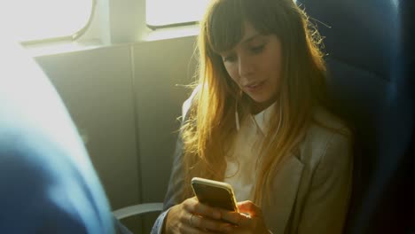 woman using mobile phone while travelling in ferry 4k