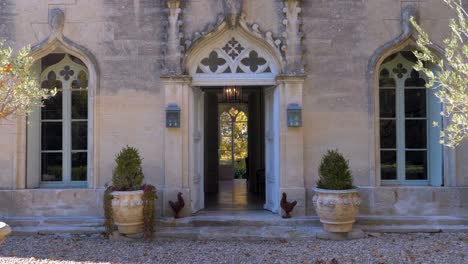 beautiful exterior view of frontal entrance door of a castle in southern france