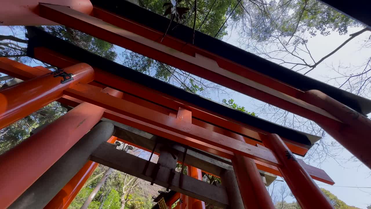 Bottom up angle of the arches in Fushimi Inari Taisha in Kyoto Japan