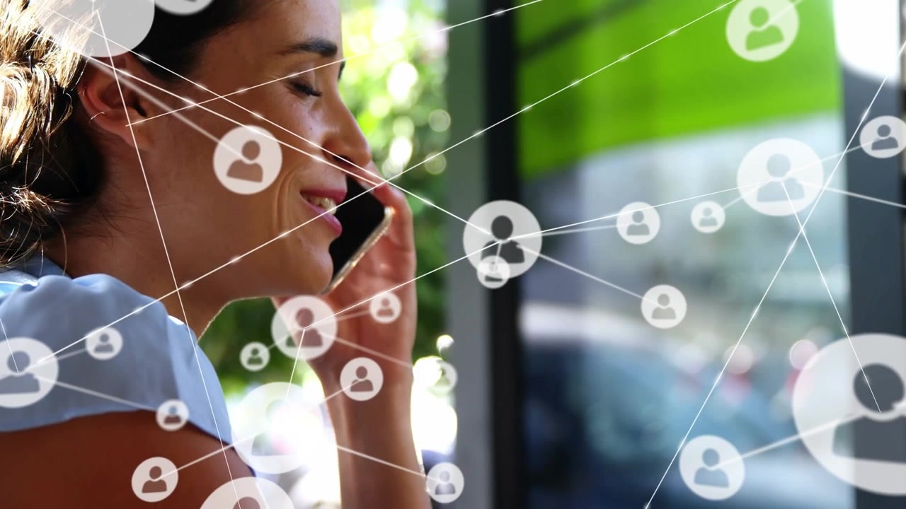 Animation of network of connections over businesswoman talking on smartphone