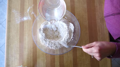 stirring scone ingredients - flour water baking powder - 60fps