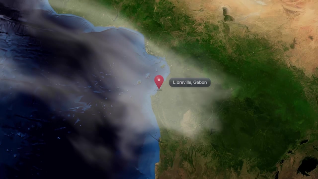 Realistic 3D satellite animation zooming from outer space directly down to Libreville, Gabon. Includes NASA public domain imagery.