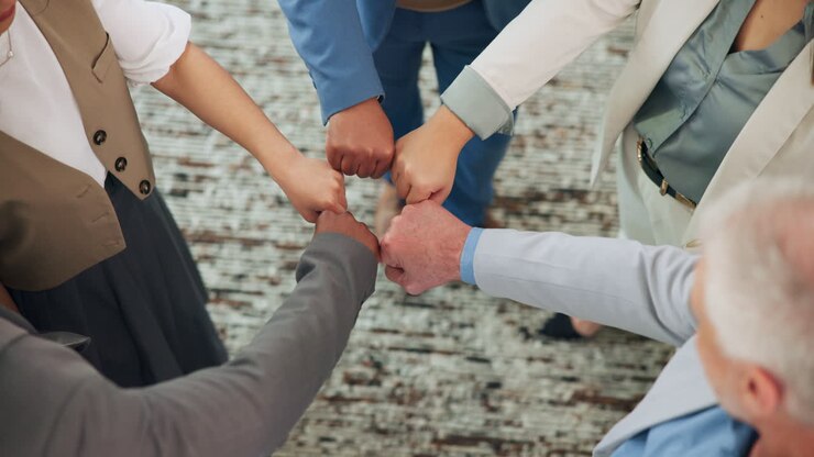 Diverse Business Team Showing Unity with Fist Bump