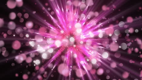 espinas rosadas giratorias y manchas de luz