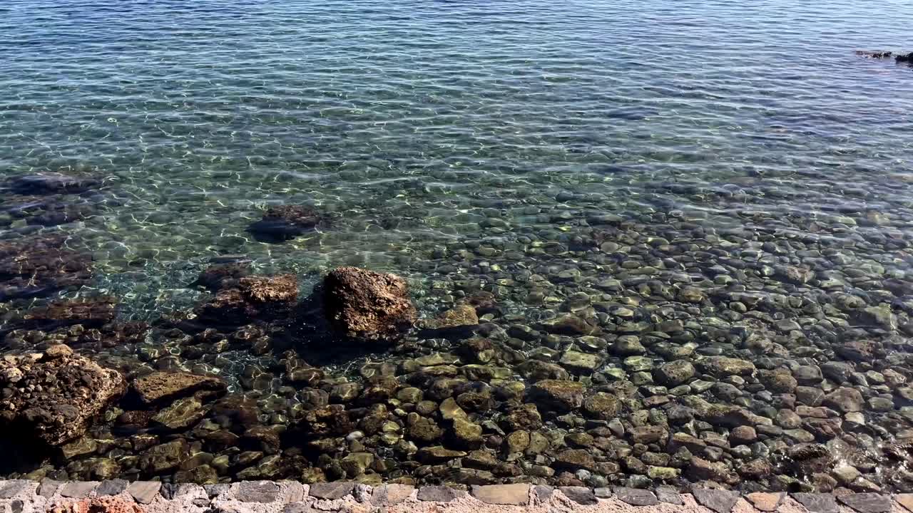 Clear water over rocky coast, Crete Island, Greece