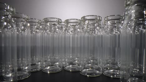 rows of empty glass vials