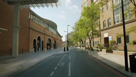 quiet street scene near a london train station