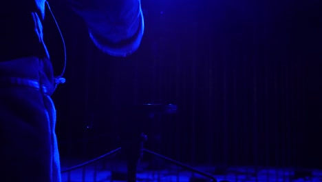 light following the movement of a woman's hand