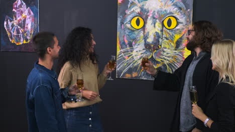 friends enjoying drinks at an art gallery