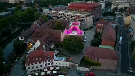 4k aerial drone video of band performing in the ruins of a medieval church in nurnberg, germany