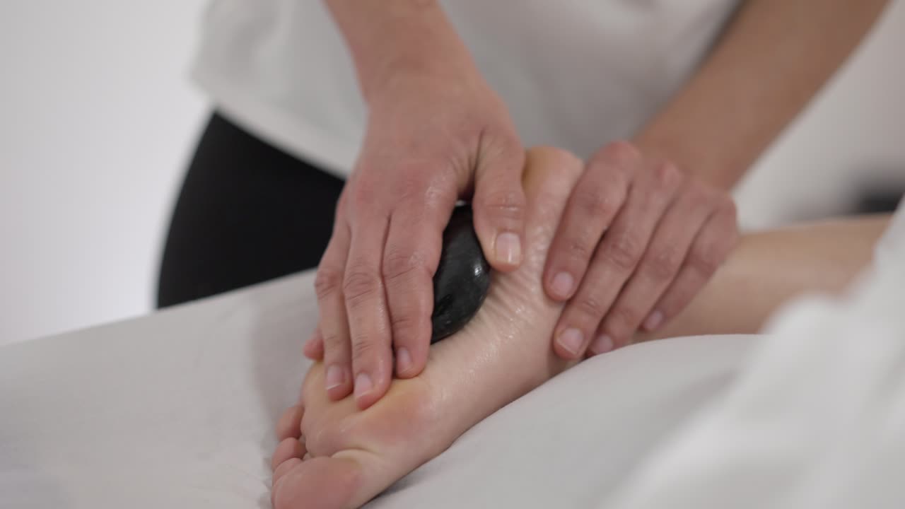 terapia de piernas de fusión de piedras calientes