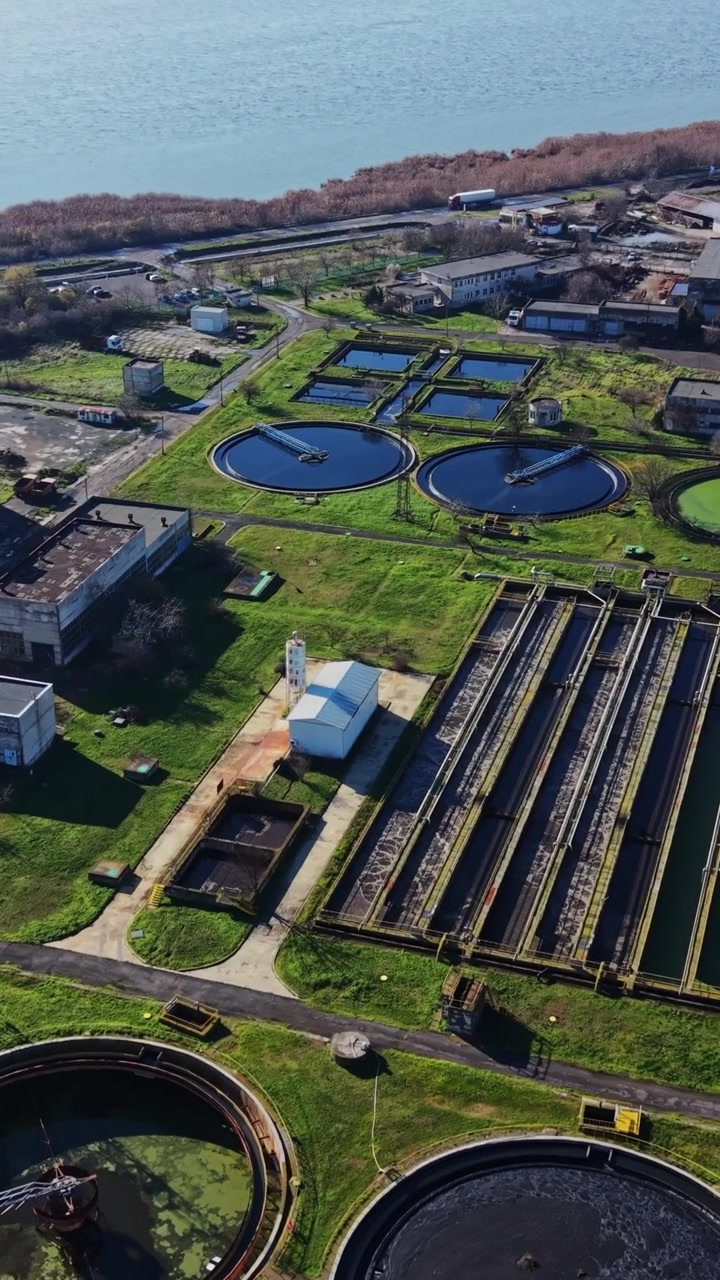 Wastewater treatment facility near water body with industrial area