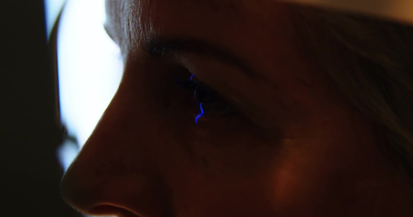 Optometrist examining patient eyes with slit lamp 4k
