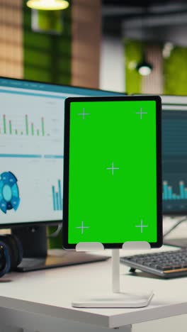 vertical video empty corporate office includes analytics tools and mockup on tablet