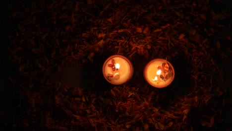 tilt up to diyas or lamps lit up for diwali 'festival of light', the most important ancient hindu festival celebrated signifying victory of light over darkness