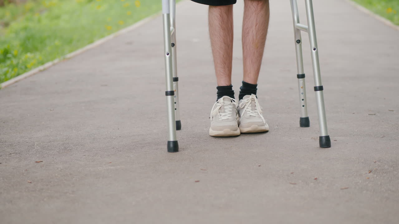 Person walking with crutches