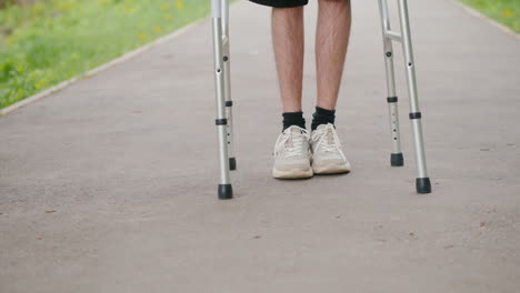 person walking with crutches