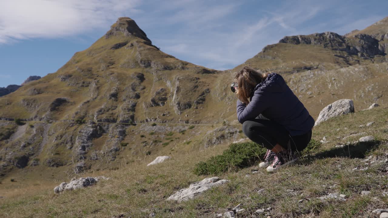 Kneeling Woman Photographing Mountain Scenery Durmitor National Park