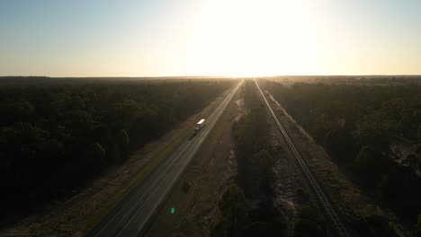 aerial views over a truck traveling on the warrego highway looking east of miles queensland.