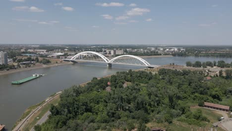 Flyover forested military base on Danube River in Novi Sad, Serbia