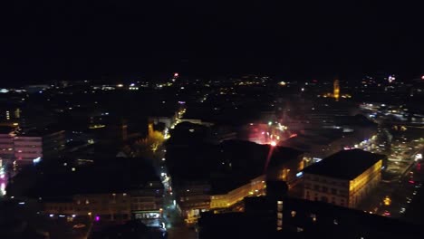 new year's eve and fireworks celebration over kaiserslautern city skyline