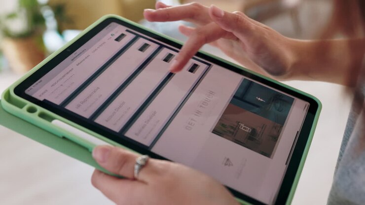 Woman Using Tablet for Job Application