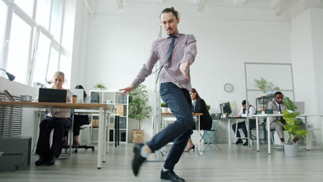 man dancing in office