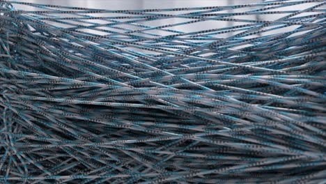 abstract interwoven blue and gray strings