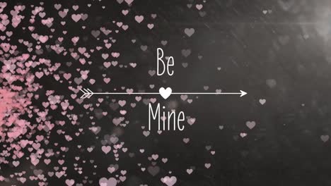 animation of be mine in white letters with pink hearts in background