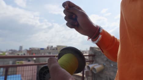 indian man enjoying indian festival makar sankranti