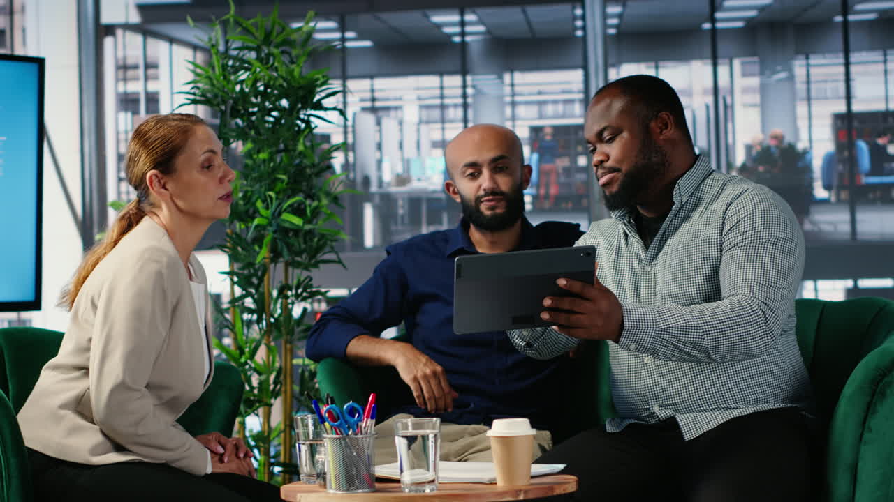 Vertical Video CEO and team members sharing foresight and leadership skills during meeting