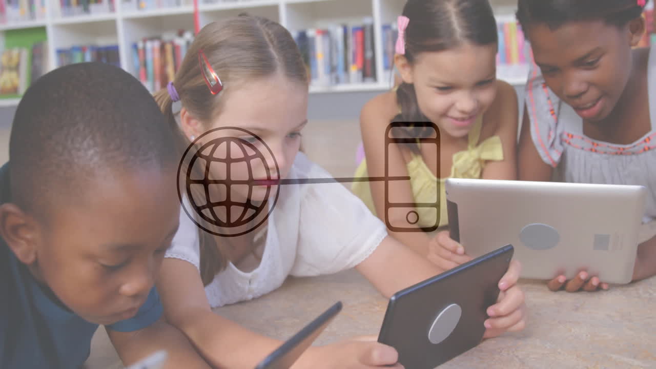 four children tapping tablets in education library, displaying floating book icons and data charts