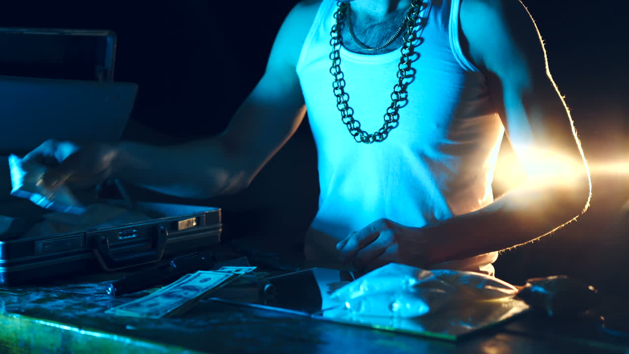 Drug addict or drug dealer with packages of heroin and cocaine. Criminal Business