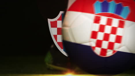 football player kicking croatia flag ball