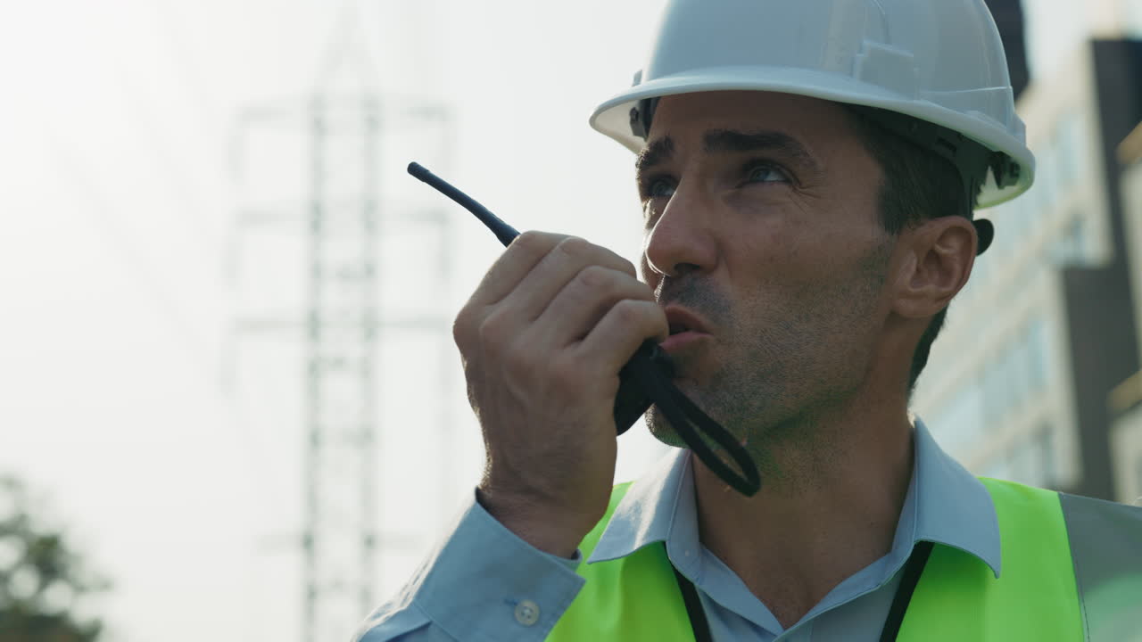 Construction Worker Using Walkie Talkie