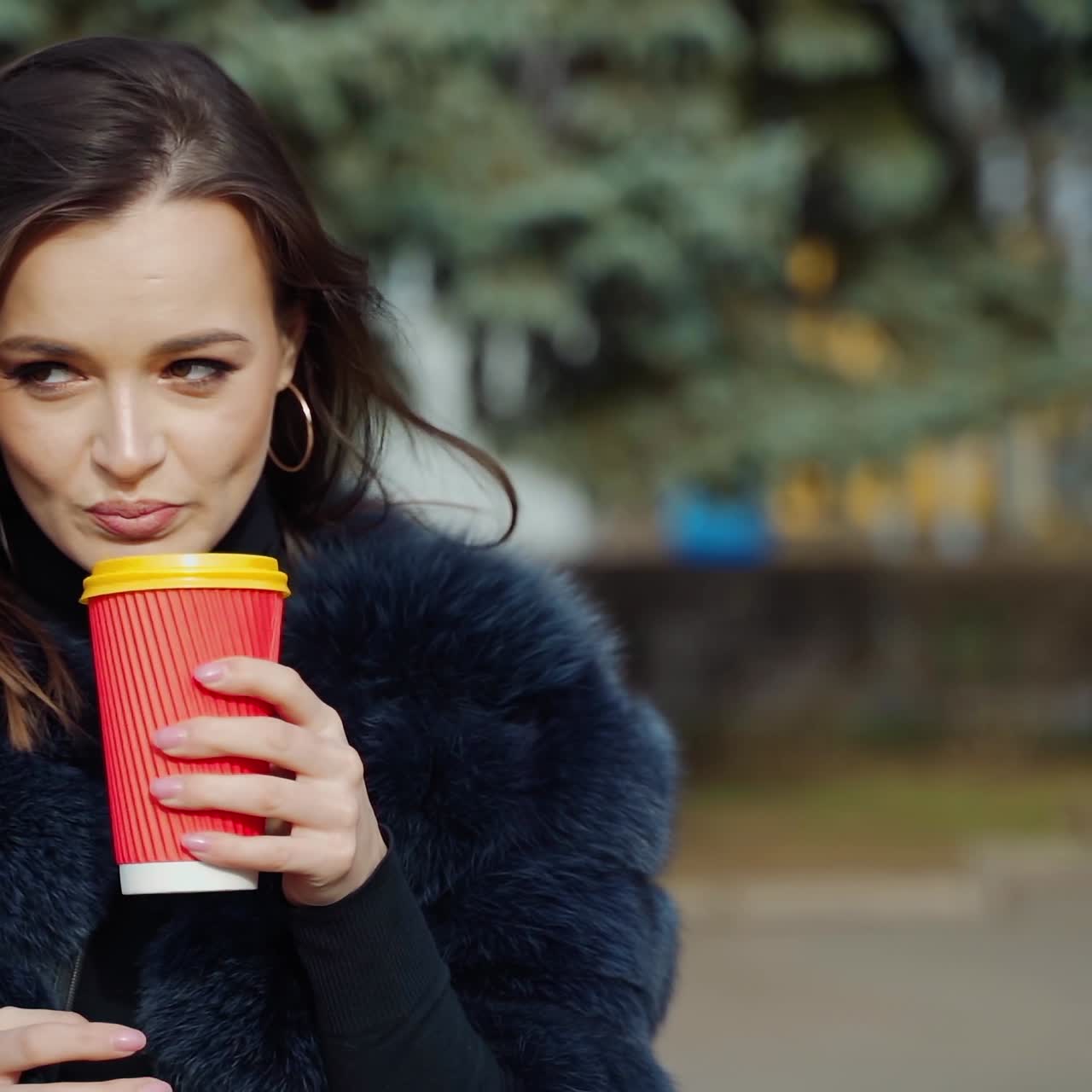 Happy woman with cup of coffee