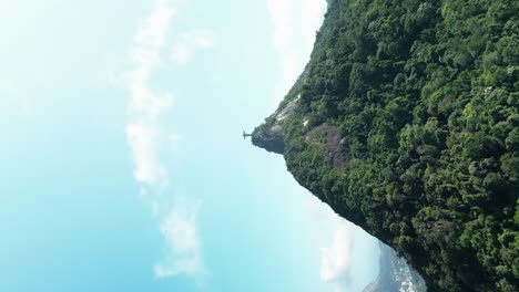 zoom-out vertical video of rio de janeiro viewpoint world wonder christ the redeemer in brazil