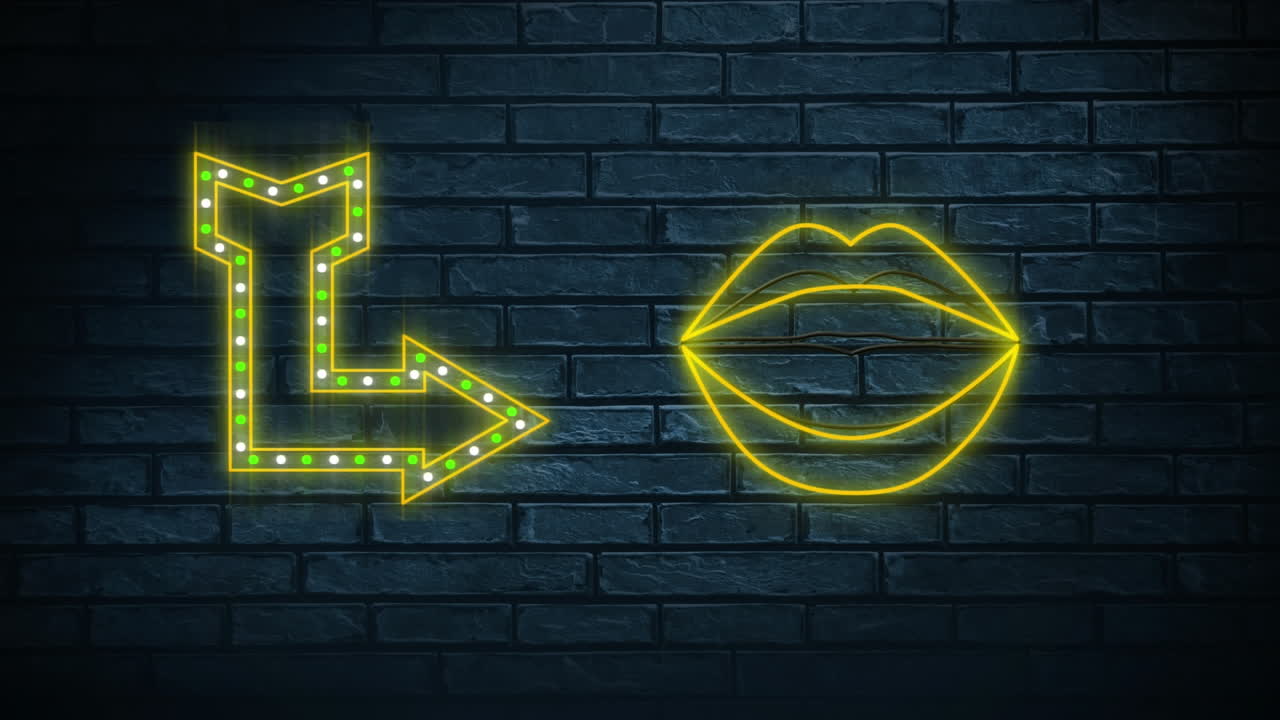 letrero de neón que muestra flecha y labios