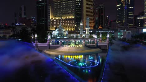 kuala lumpur ciudad centro famoso río de la vida bahía cruzando iluminación nocturna espectáculo panorámico aéreo 4k malasia