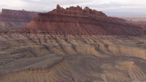 a wide panning shot of a canyon in a mesa desert