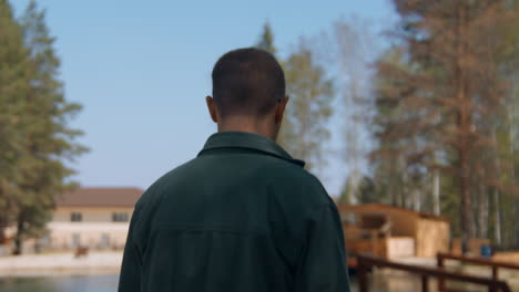 man walking in the forest