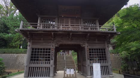 the entrances of the temples in japan have a very old architecture based on the system of sockets and carved by hand