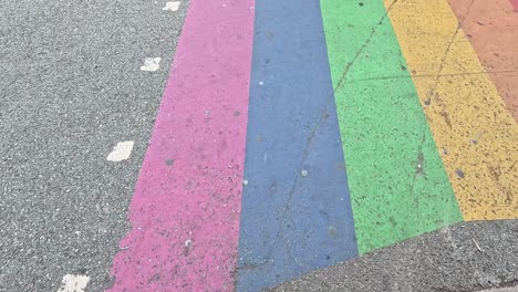 people crossing rainbow street in camden town