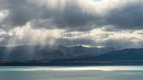 Lake-Pukaki-in-New-Zealand's-South-Island---dramatic-time-lapse-with-crepuscular-rays-shinning-through-the-clouds