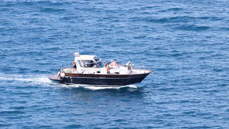 a boat cruising in sorrento, naples, italy