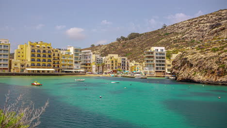 the azure blue water of the sea at xlendi bay on the island of malta